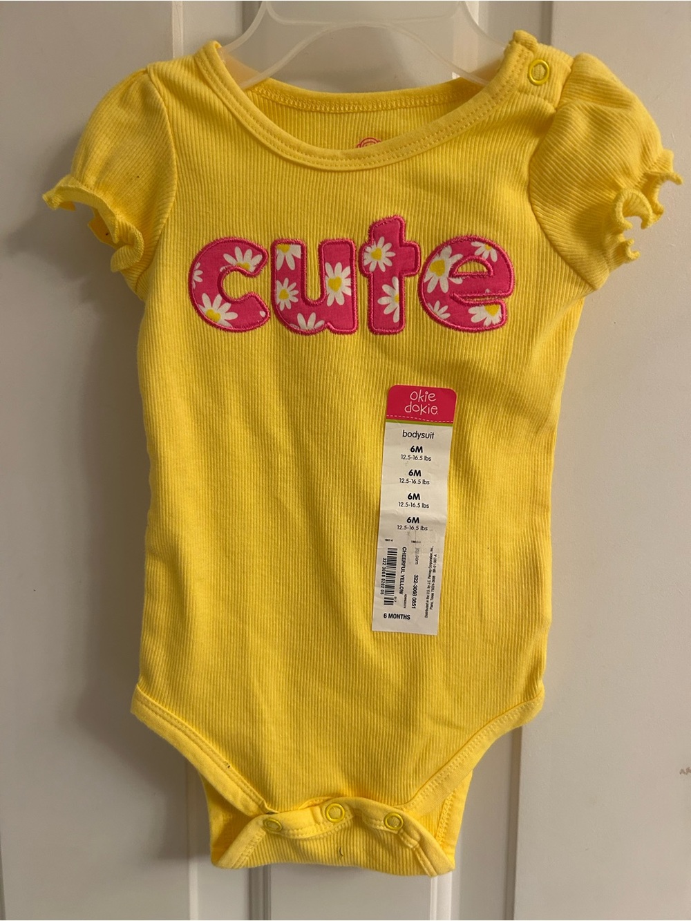 NWT-okie dokie Yellow Bodysuit with Pink 'cute' Appliqué